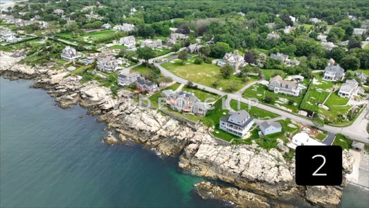 CLIP 2 - Boston, MA aerial of homes along the rocky coastline of Massachusetts Bay