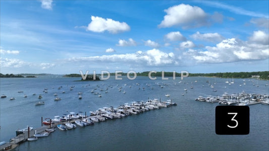 CLIP 3 - Boston, MA blue sky and clouds above marina with boats in harbor