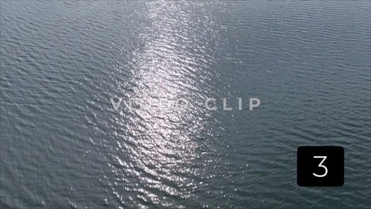 CLIP 3 - Canadice Lake, NY looking down on sunlight reflecting on peaceful water