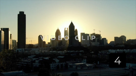CLIP 4 - Atlanta, GA Vol. 1 - day begins in downtown with sun behind office buildings