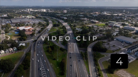 CLIP 4 - Jacksonville, FL looking down on interstate highway I-95 then tilting up towards horizon