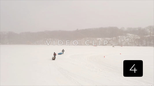 CLIP 4 - Winter Vol. 3 - Winter father and son walking on frozen Irondequoit Bay to ice fish