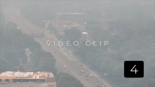 CLIP 4 - Rochester, NY Vol. 8 - Canadian wildfire smoke over traffic on highway