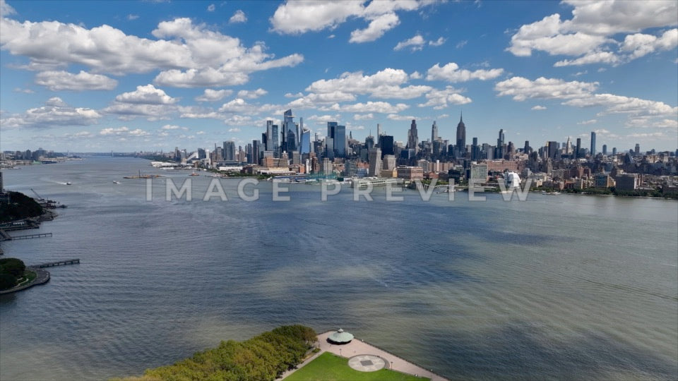 Photo - New York City, NY Clouds shadows on Hudson River with skyline