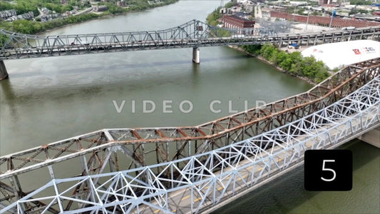 CLIP 5 - Cincinnati, Ohio Iron truss bridges with traffic driving over Ohio River