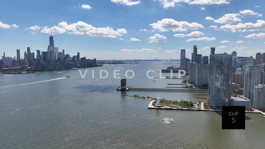CLIP 5 - New York, NY aerial flight over Hudson River with New York City and New Jersey skylines