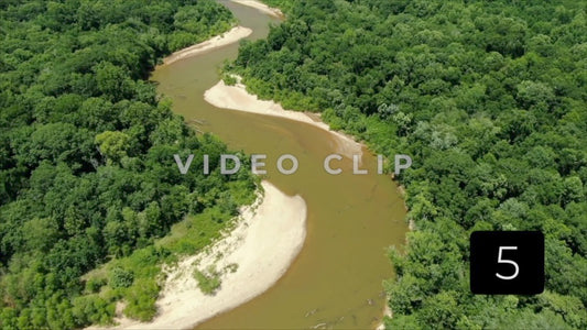 CLIP 5 - Flint River - aerial flight over river through dense forest Montezuma, GA