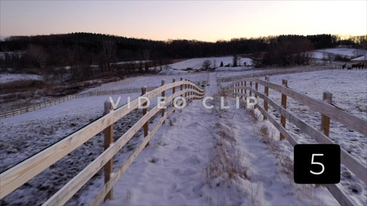 CLIP 5 - Winter Vol. 2 - Horse farm fence during Winter with snow in pastures
