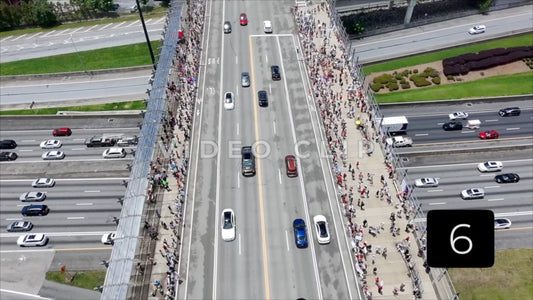 CLIP 6 - Atlanta, GA No Kings Protest - Flight above highway overpass with protesters below