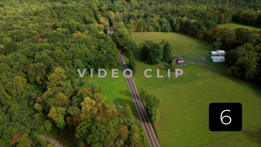 CLIP 6 - Ohiopyle, PA car travels past mountain top home and green pastures