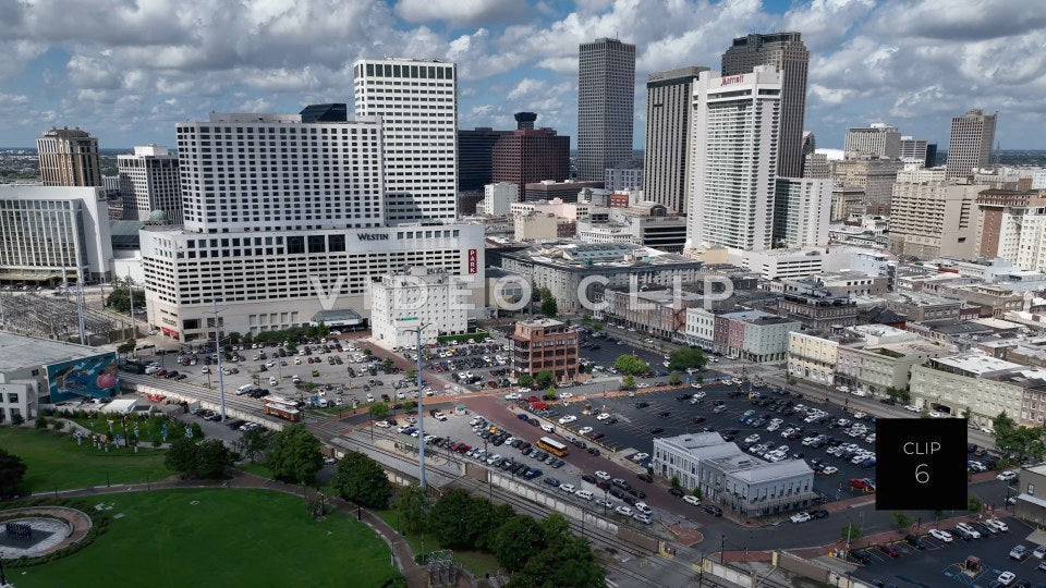 CLIP 6 - New Orleans, LA grand view of skyline as streetcars pass by downtown