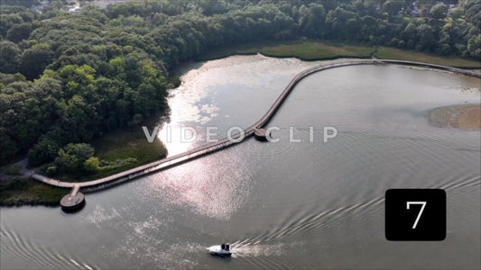 CLIP 7 - Rochester, NY Vol. 4 - Genesee Riverway Trail boardwalk in afternoon sunlight with boat passing by