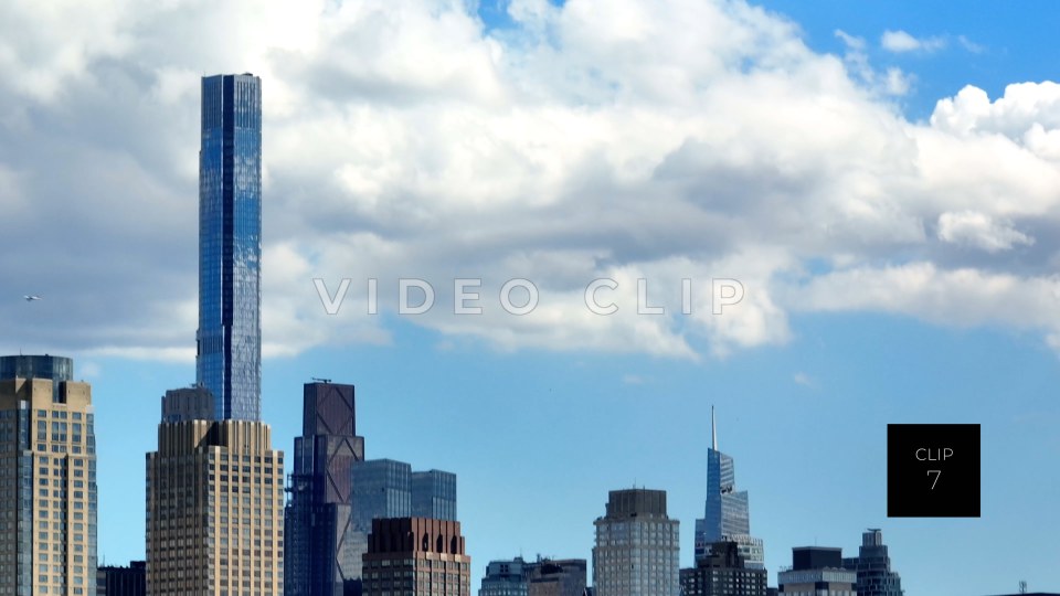 CLIP 7 - New York, NY Sky view then panning down to apartment buildings and glass office towers