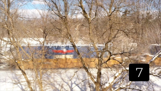 CLIP 7 - Winter Vol. 5 - Train with shipping containers moving through Winter landscape