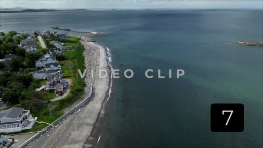 CLIP 7 - Boston, MA aerial of coastline of Massachusetts bay with city skyline on horizon