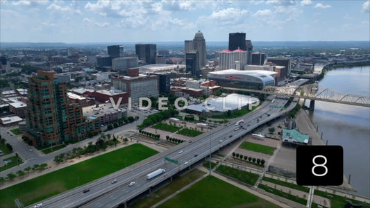 CLIP 8 - Louisville, KY slow flight over highway towards downtown skyline