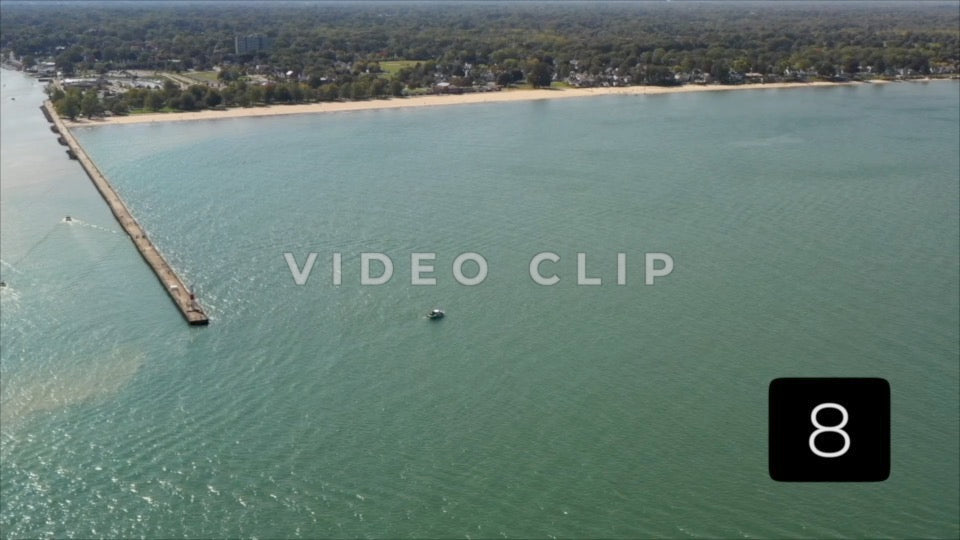 CLIP 8 - Rochester, NY Vol. 5 - Aerial view over Lake Ontario of Ontario Beach Park and Charlotte Pier
