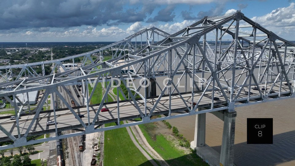 CLIP 8 - New Orleans, LA tracking the length of Crescent City Connection Bridge as traffic crosses Mississippi River