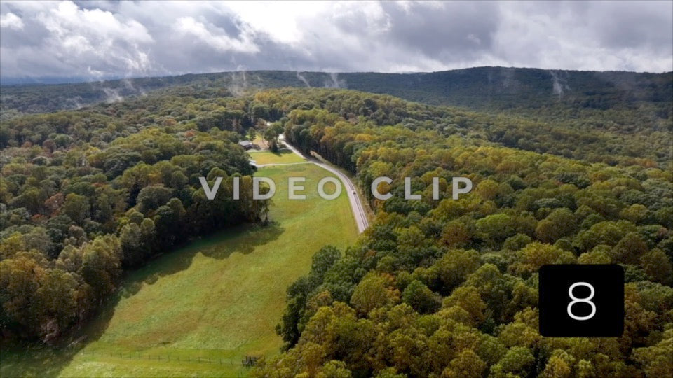 CLIP 8 - Ohiopyle, PA rain clouds pass over mountain top home as car drives by