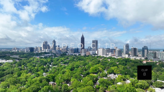 CLIP 8 - Atlanta, GA aerial above neighborhoods to city skyline office towers