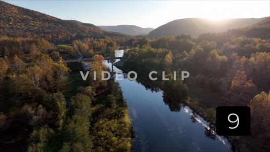 CLIP 9 - Tioga Dam and Reservoir, PA RV drives over bridge as the sun sets behind mountains