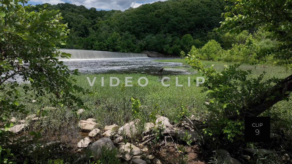 CLIP 9 - Lynchburg, VA green grassy shoreline below waterfall dam