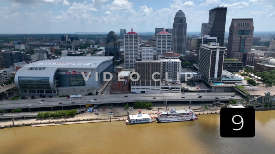 CLIP 9 - Louisville, KY downtown view with Bello of Louisville Riverboats docked on Ohio River