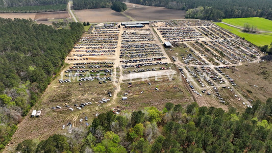 4k Still Frame - Hemingway, SC aerial view of junkyard cars