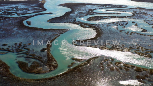 4k Still Frame - Murrells Inlet, SC looking down on waterways in tidal marsh