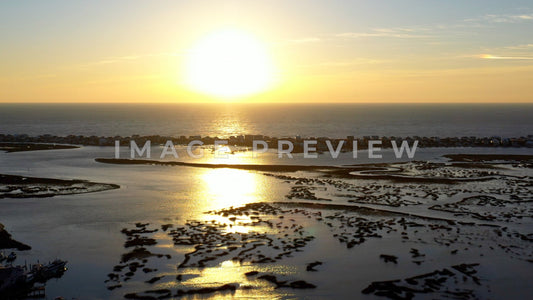 4k Still Frame - Murrells Inlet, SC sunrise at beach over natural tidal marsh