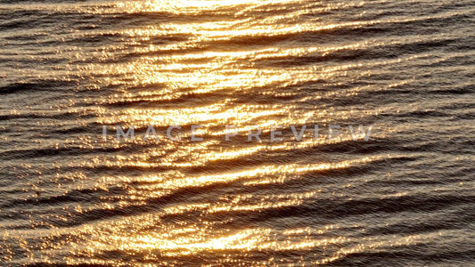 4k Still Frame - Pawleys Island, SC morning sunlight on gentle ocean waves