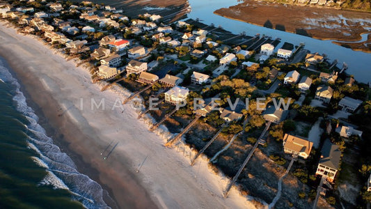 4k Still Frame - Pawleys Island, SC aerial walking along the coastline with view of beach houses
