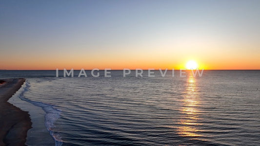 4k Still Frame - Pawleys Island, SC sunrise on the beach with coastline