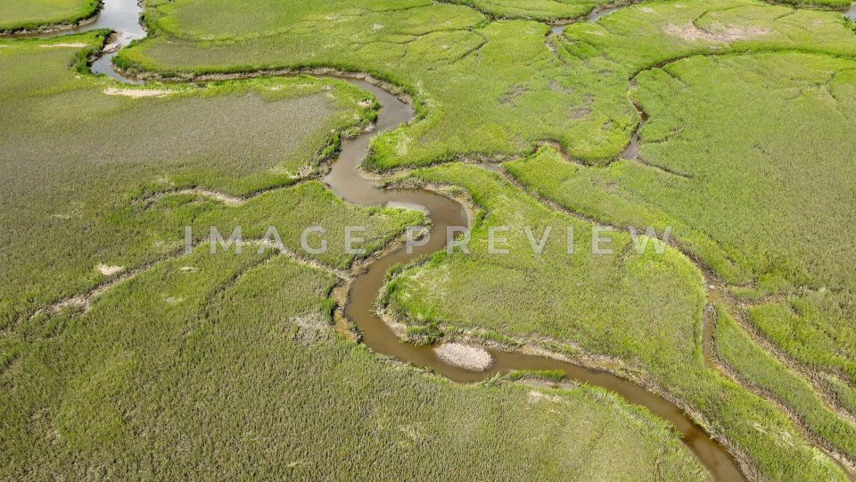 4k Still Frame - McClellanville, SC aerial looking down on natural salt water tidal marsh