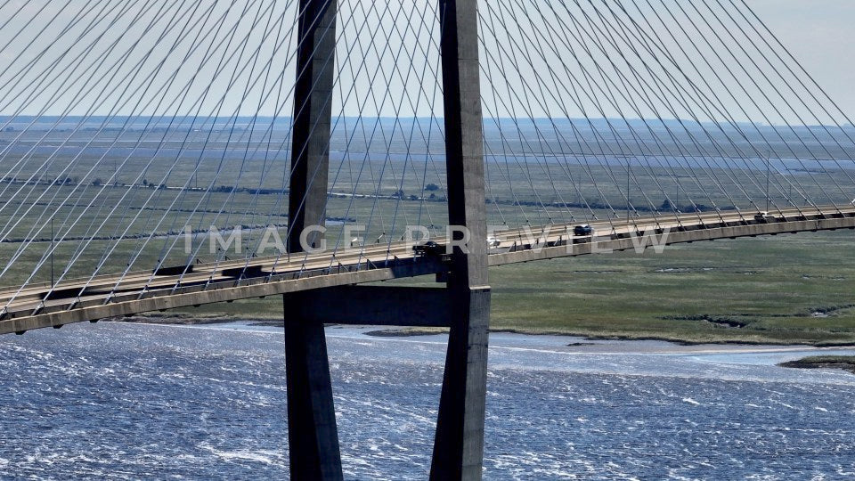Brunswick, GA close up of traffic on Sidney Lanier Bridge showing suspension cables