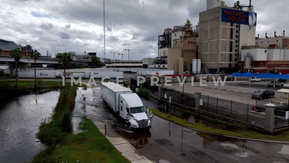 4k Still Frame - Jacksonville, FL Truck driving through flooded street after extreme rainfall