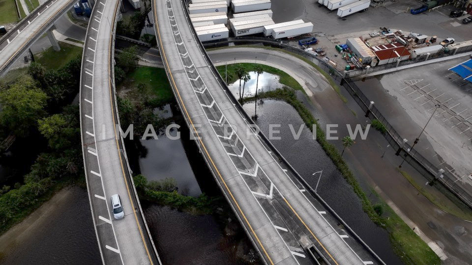 4k Still Frame - Jacksonville, FL car driving on overpass over flood after extreme rainfall