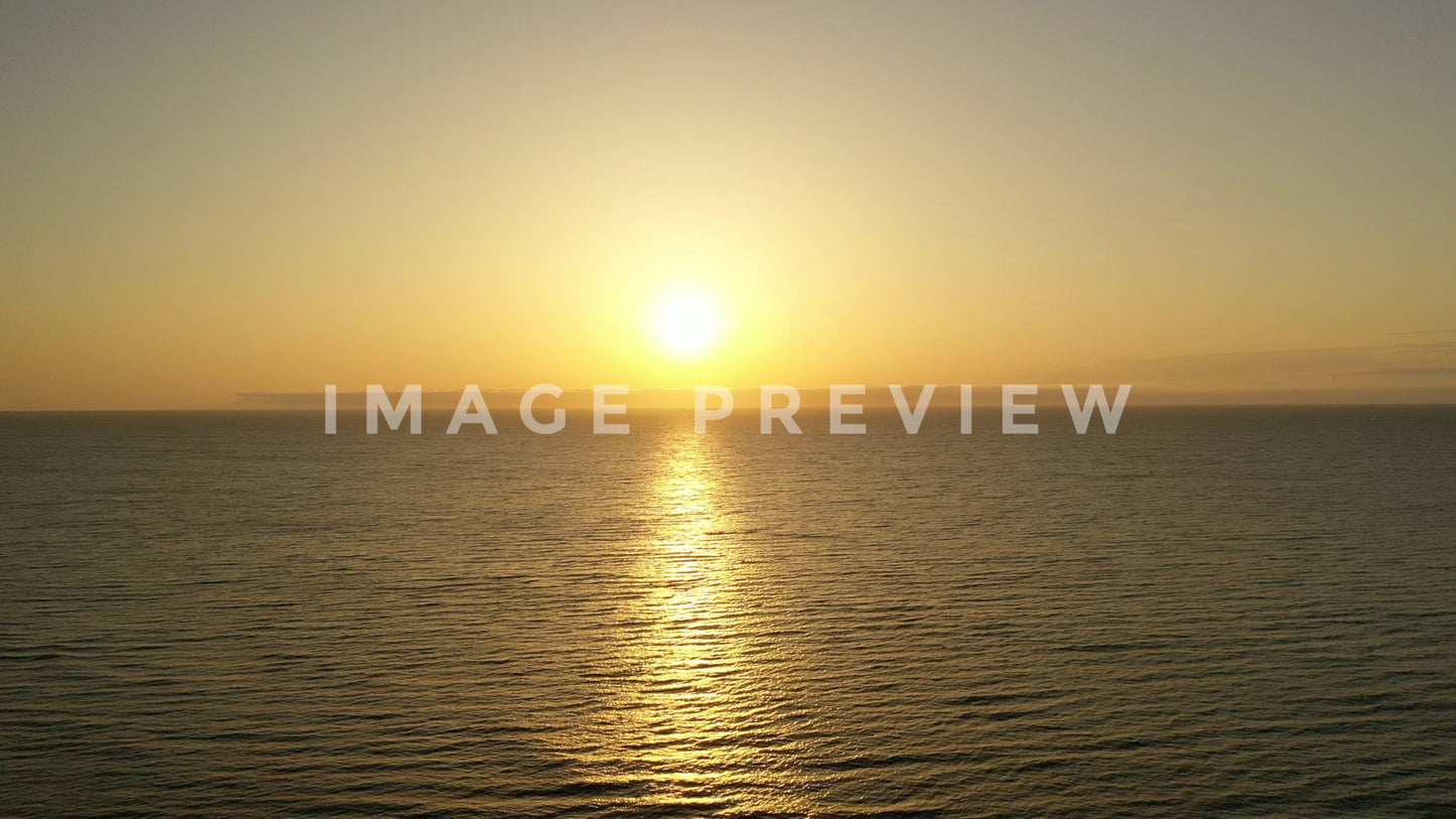 stock photo sunrise over peaceful ocean