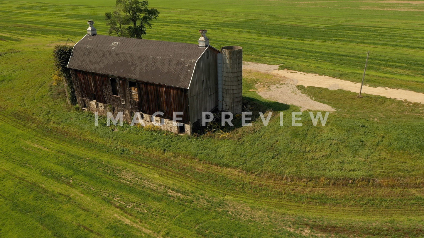 stock photo barn in green field