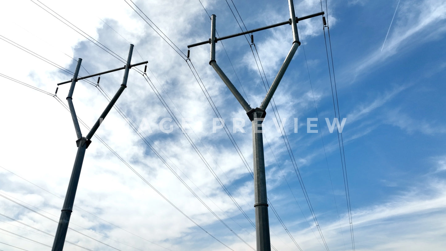 stock photo power towers blue sky