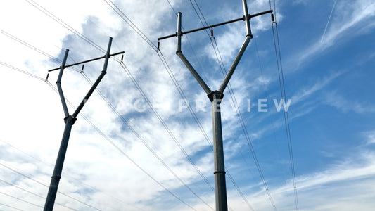 stock photo power towers blue sky