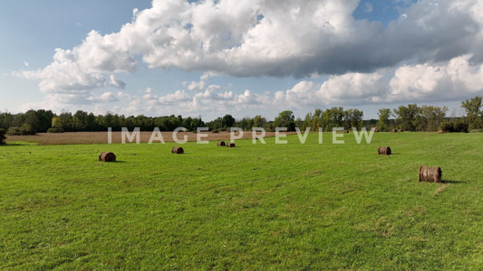 stock photo hay bales in rural farmland