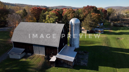 stock photo red barn on farm in Mansfield, PA