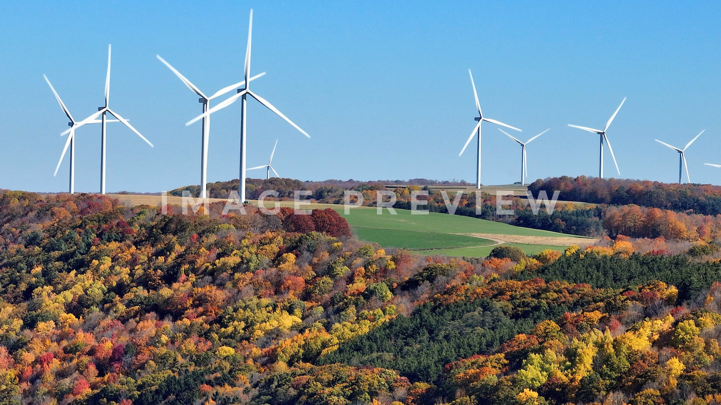 stock photo wind turbines on hillside