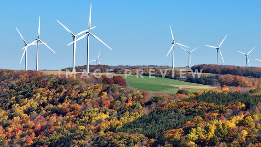 stock photo wind turbines on hillside