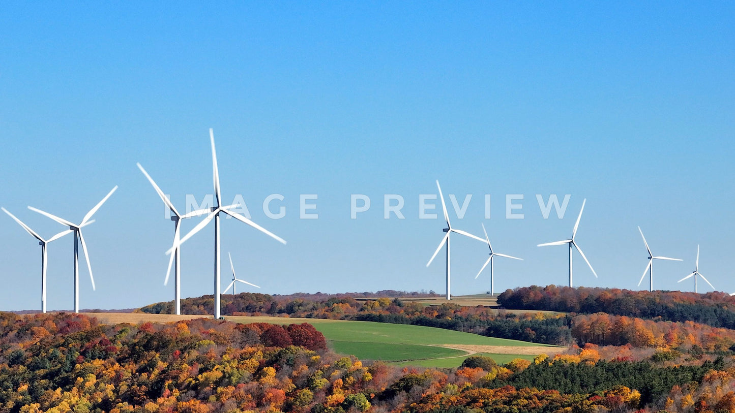 stock photo wind turbines on hillside