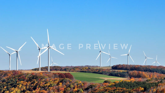 stock photo wind turbines on hillside