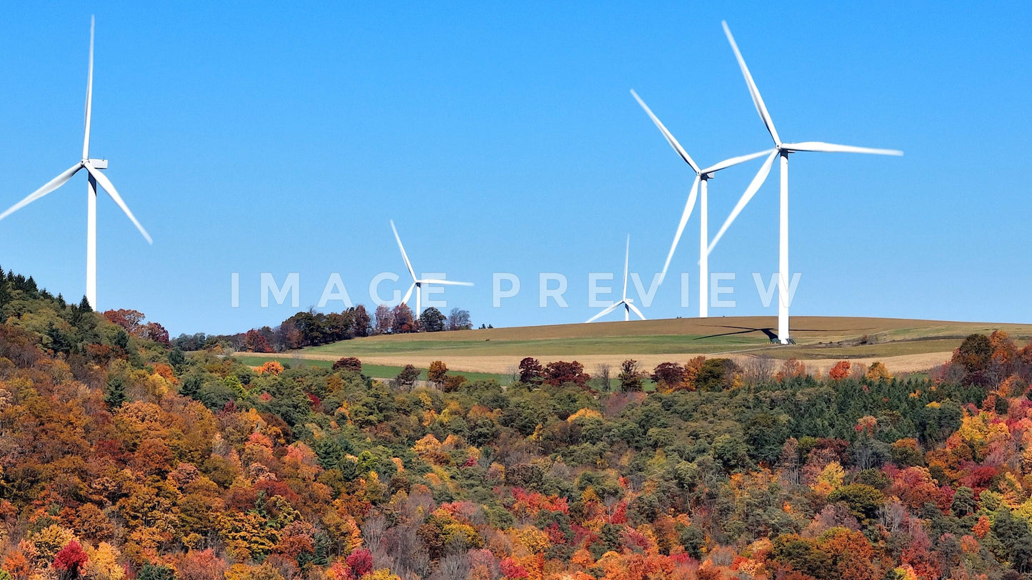 stock photo wind turbines on hillside