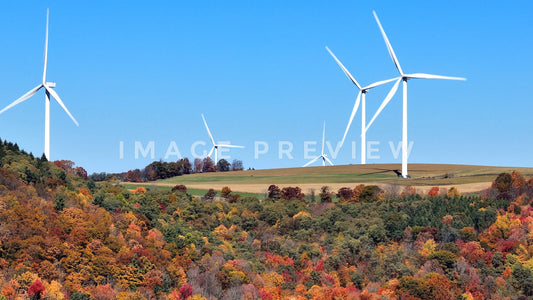 stock photo wind turbines on hillside