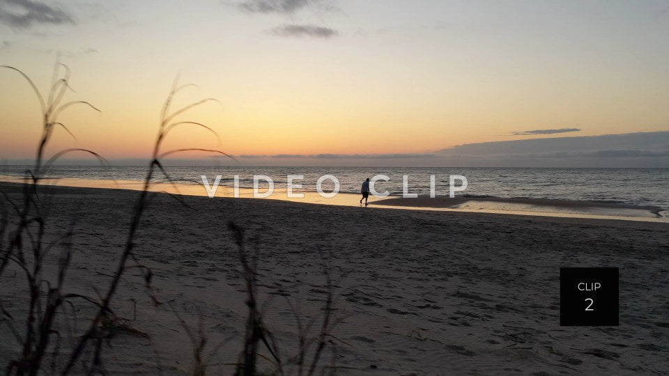 CLIP 2 - Litchfield Beach, SC person walking on beach at sunrise